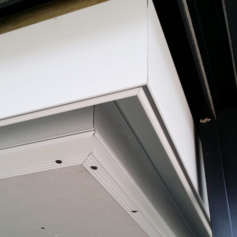 Blindspace concealment boxes meeting at a corner during construction