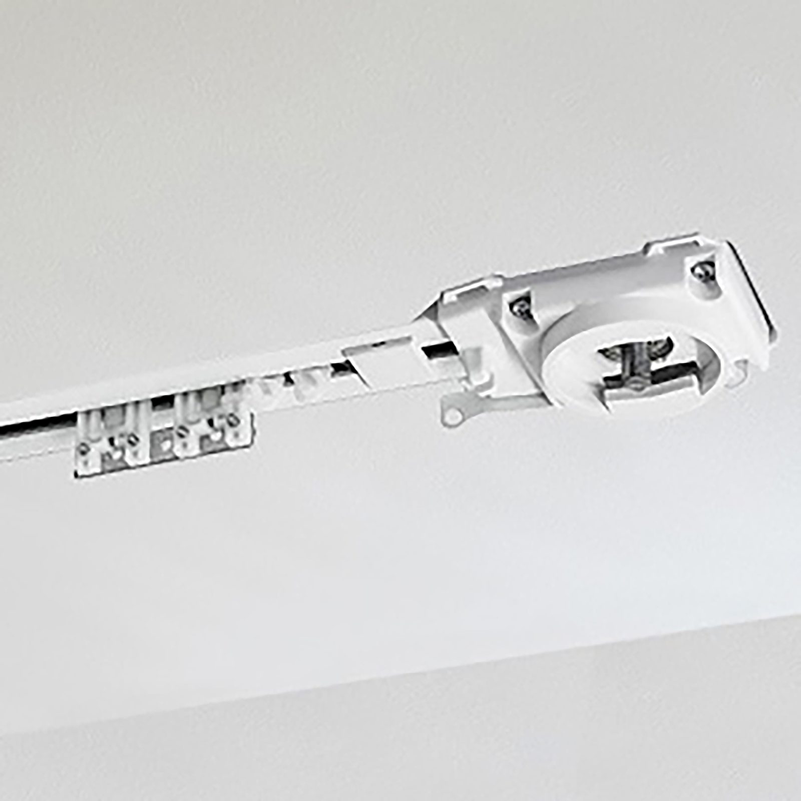 TrackTrim motor end set recessed flush in a ceiling, ready for the motorized drapery track