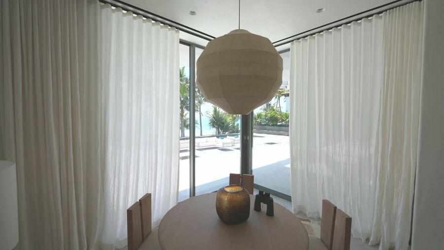 Sheer ripplefold draperies on a customized decorative Lutron track, Fort Lauderdale estate