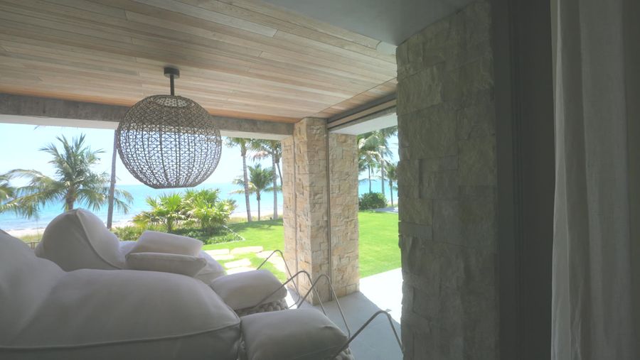Exterior shades on the ocean-facing terrace of a Fort Lauderdale estate