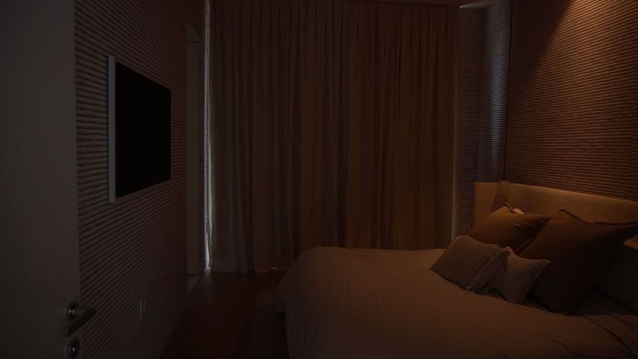 Bedroom with motorized blackout draperies fully closed, Ritz-Carlton Residences Miami Beach