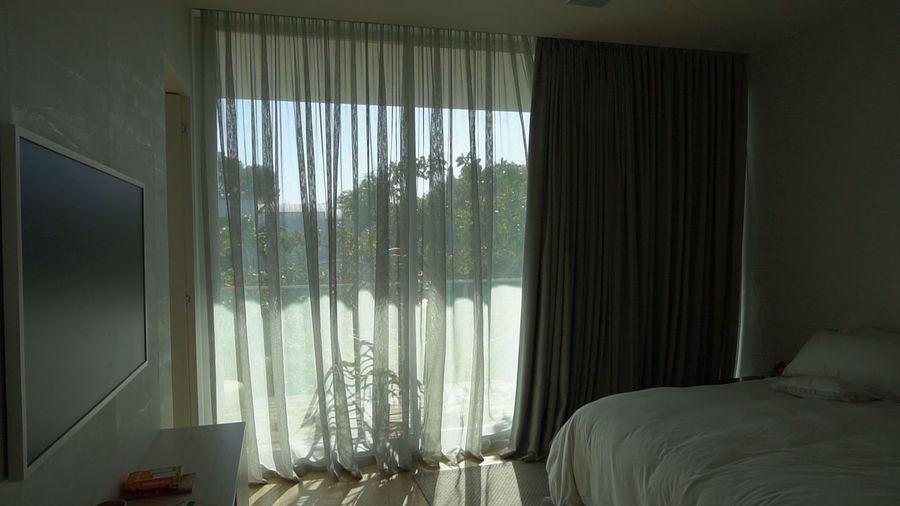Bedroom with the sheer layer closed and the blackout layer open, Miami Beach