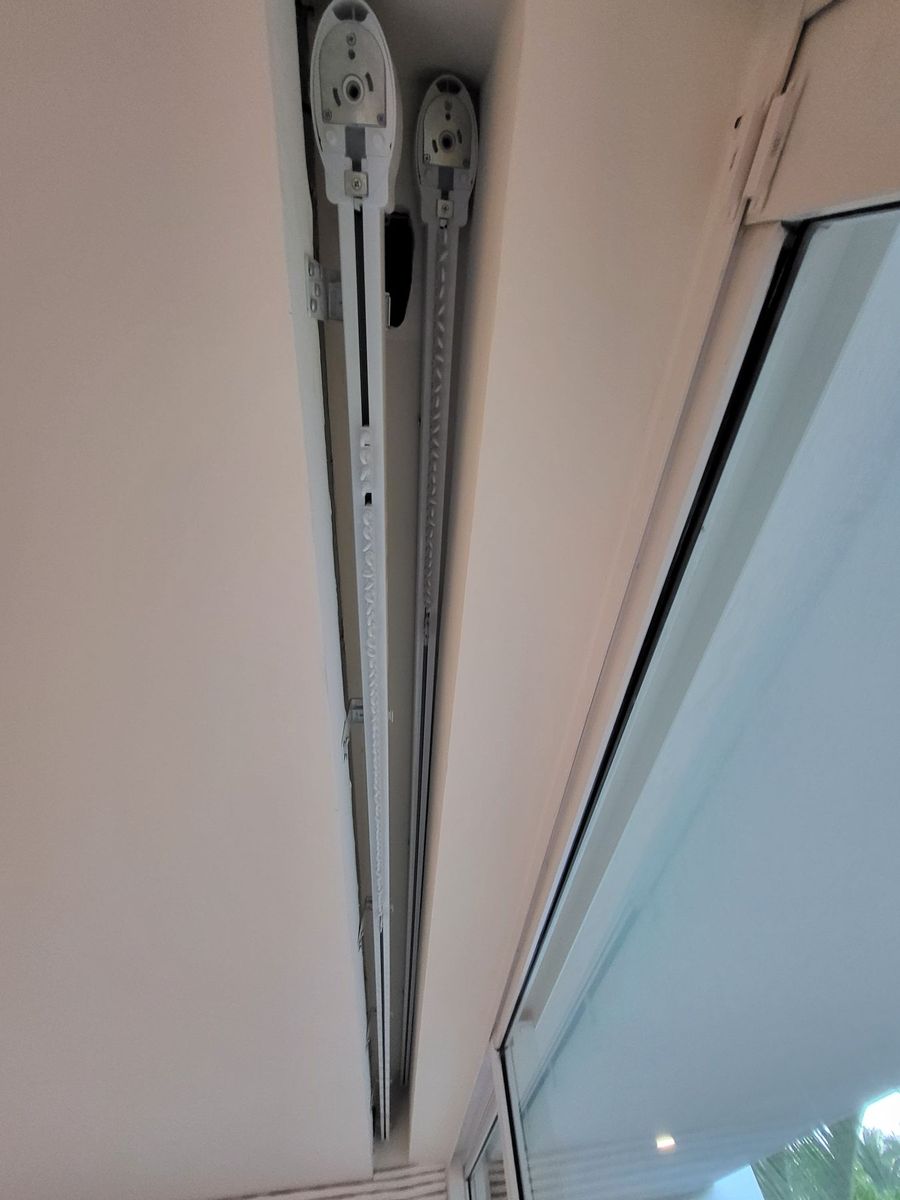 Lutron Sivoia QS drapery track set inside a recessed ceiling pocket before the draperies are hung