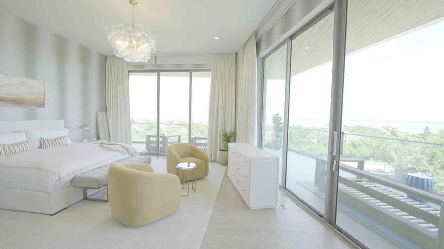 Drapery traveled open to the terrace light on Crestron QMT tracks, St. Regis Longboat Key