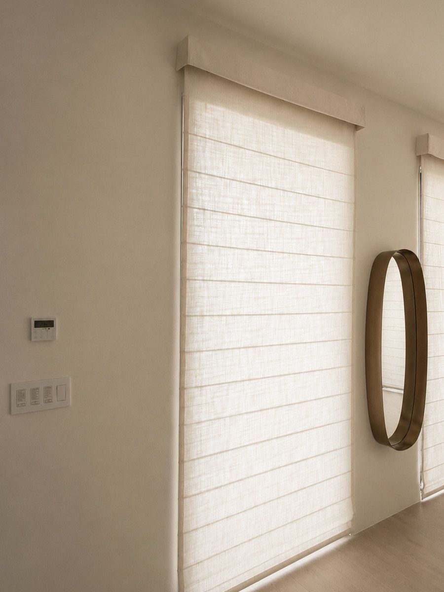 Custom roman shades on the Lutron roman-shade kit in a Turks and Caicos villa