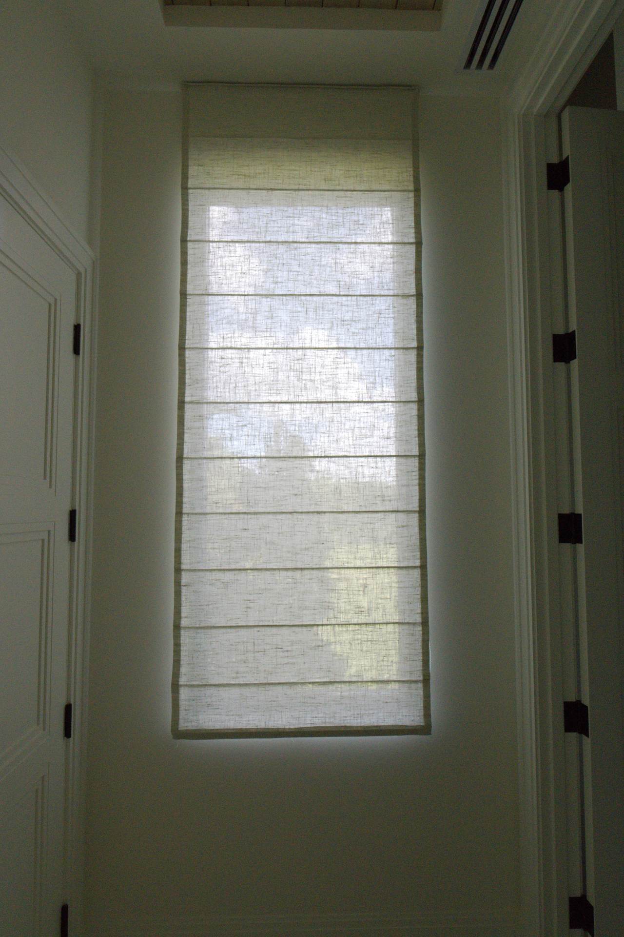 Flat Roman shade from a ceiling pocket at the end of a hallway, Landmark Ranch Estates, Southwest Ranches