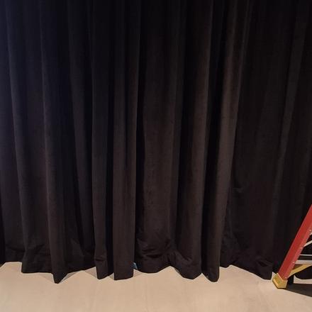 Alendel Zurich velvet in Darkness installed in the theatre beside the glass wall